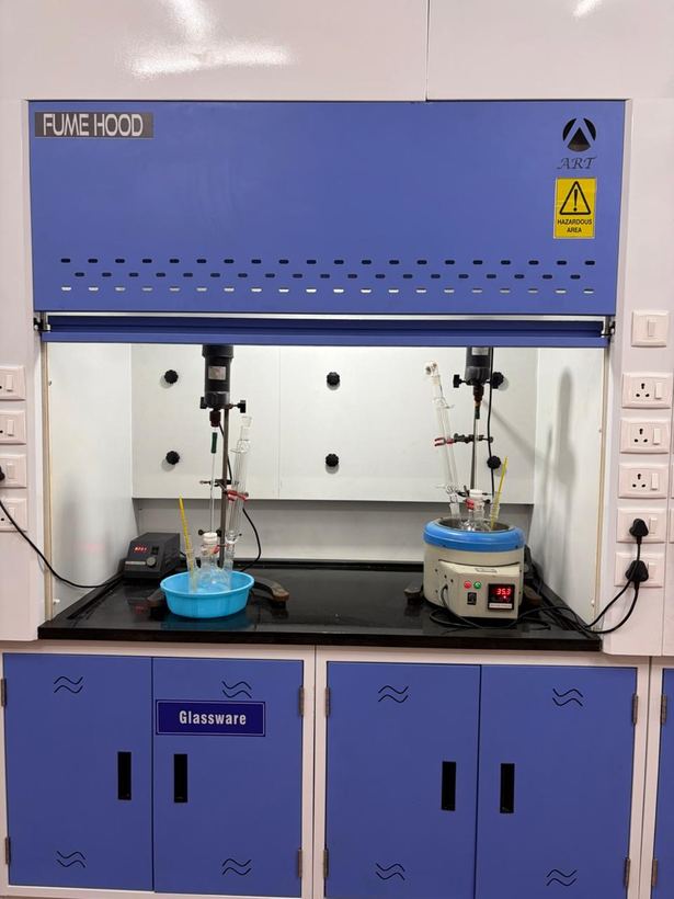 Fume hood with round-bottom flasks, overhead stirrer and heating mantle